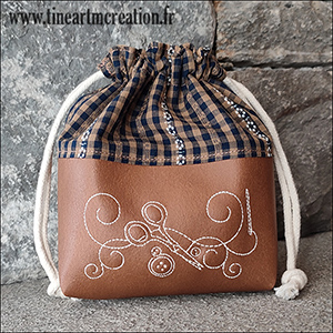 Broderie machine sur simili cuir